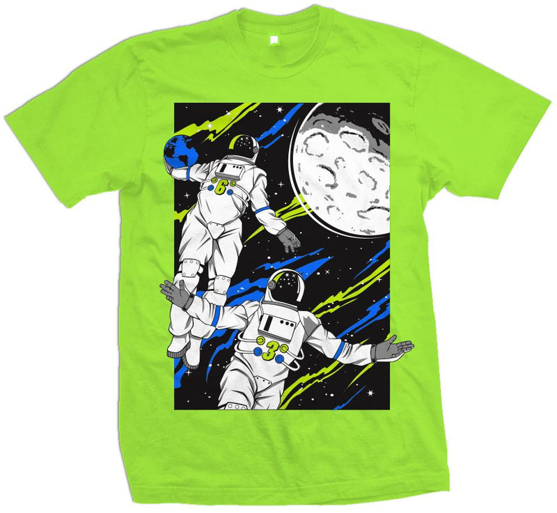Electric green t-shirt with white, green, and blue astronauts alley-ooping to the moon on black background.