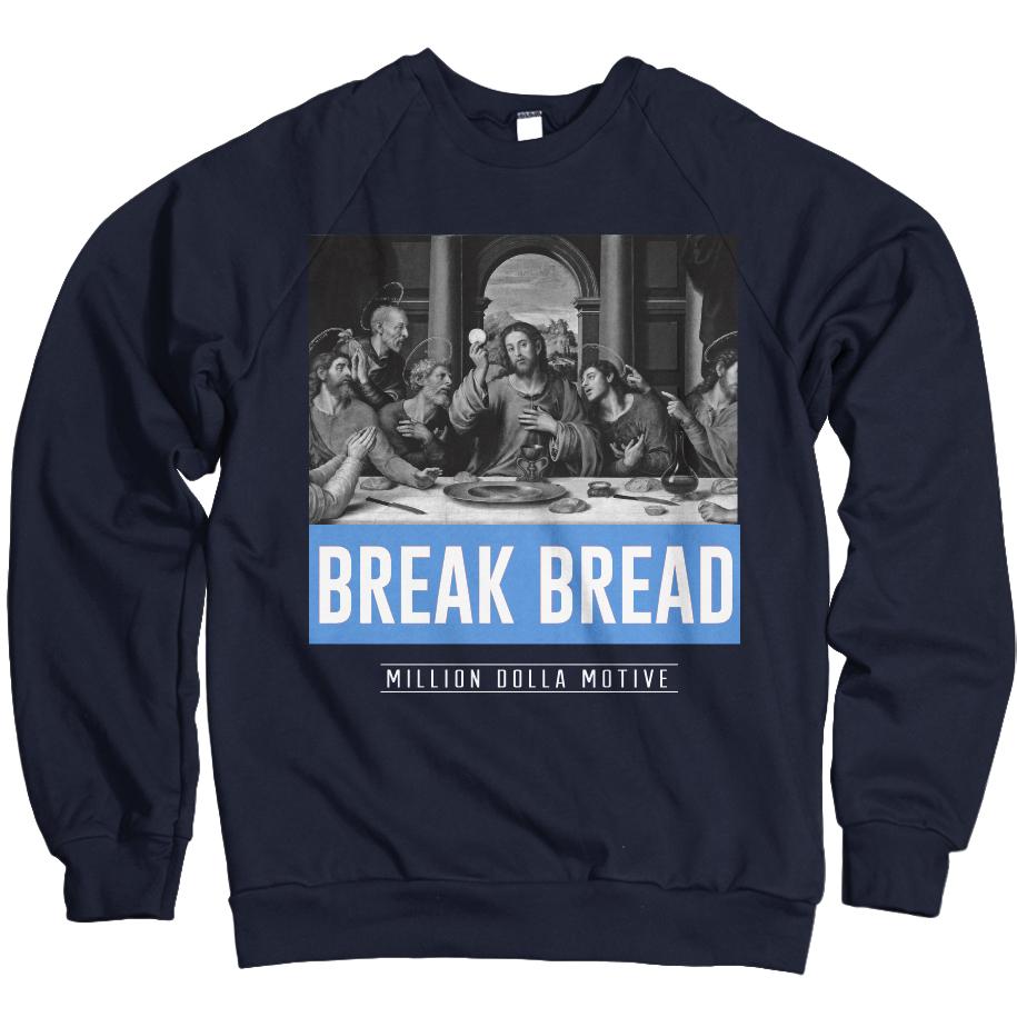 Navy blue t-shirt with black and white last supper painting with unc university blue and white break bread text.