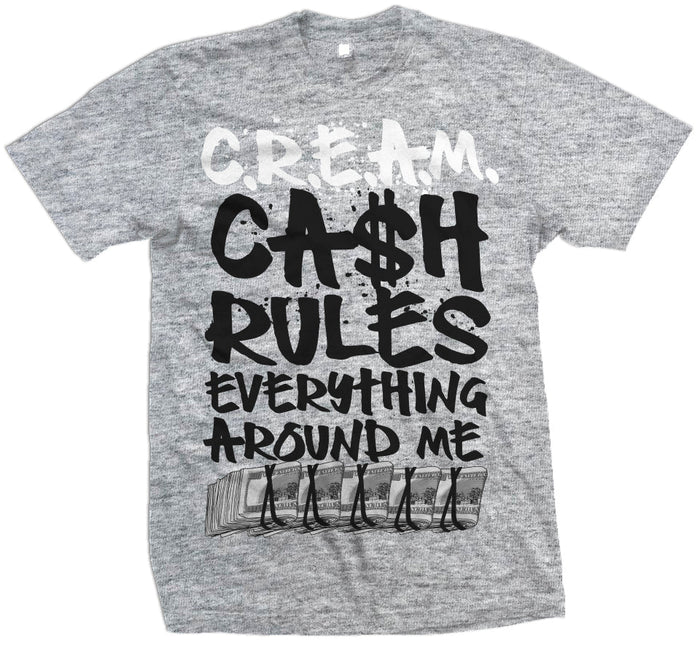 Heather grey t-shirt with white and black cream, cash rules everything around me text with hundred dollar bill row.