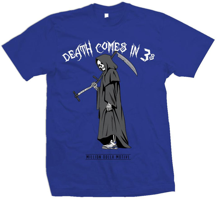 Royal blue t-shirt with black, grey, and white grim reaper and white death comes in 3's text.
