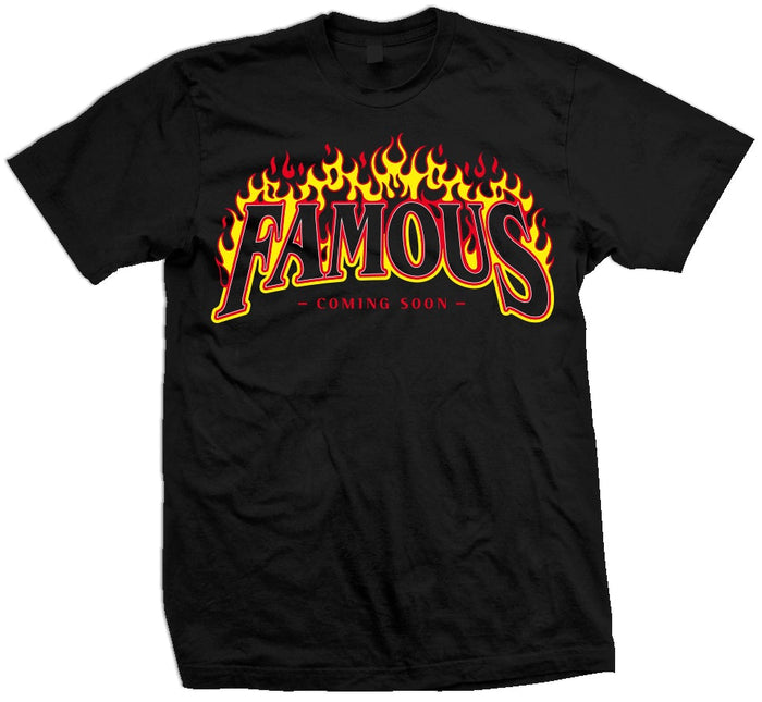 Black t-shirt with yellow, orange, and red flames on black, red, and yellow famous coming soon text